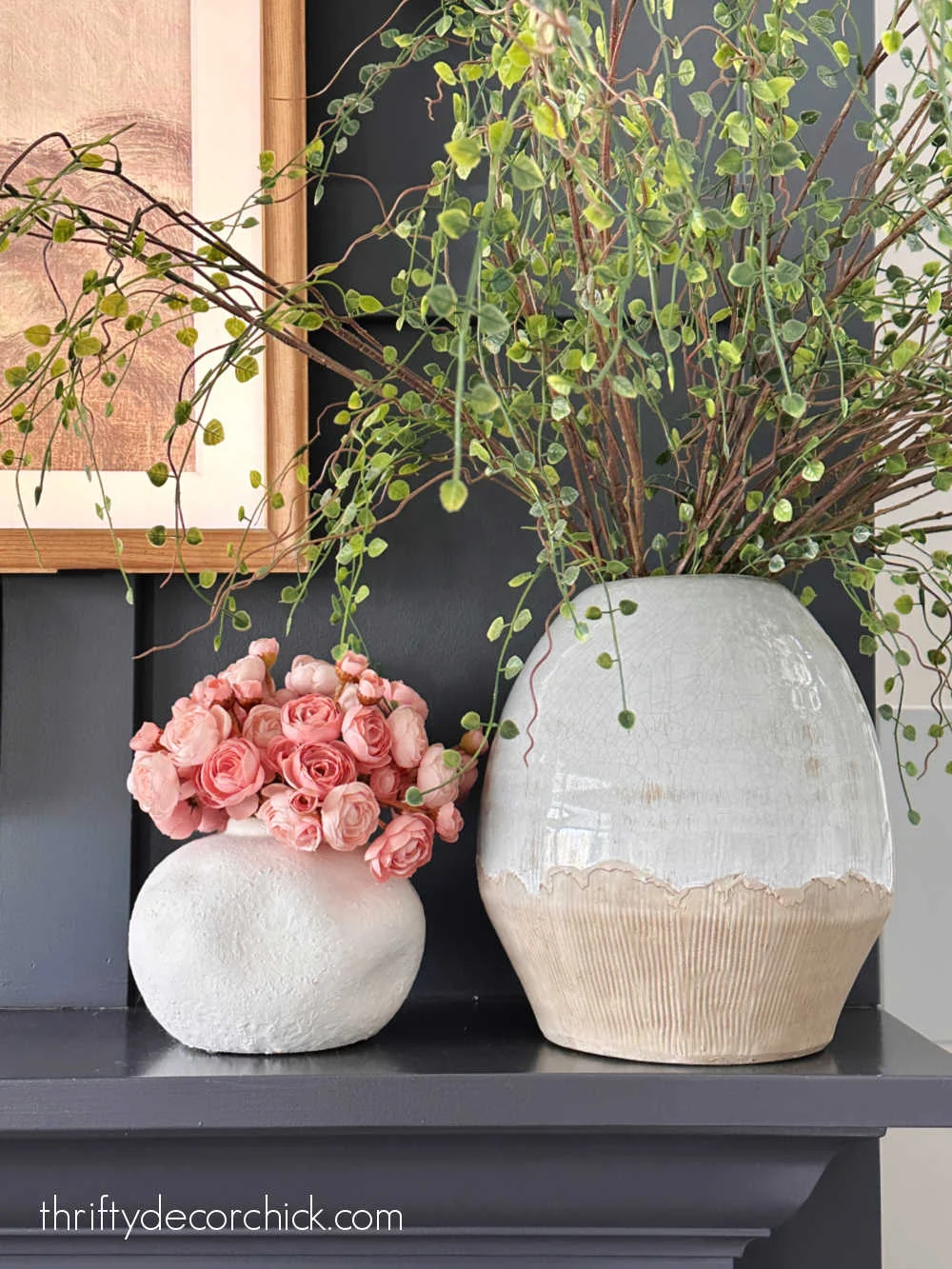 vases with flowers on mantel